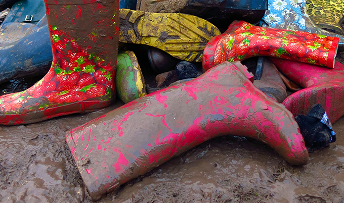A pile of muddy wellies
